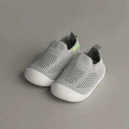Light gray slip-on baby sneakers with soft flexible sole